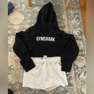 Gymshark black cropped hoodie and white cotton shorts